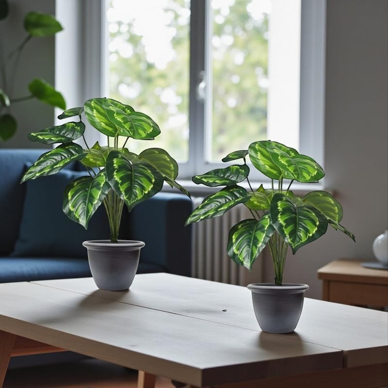 GoHooked Pack of 2 artificial monstera plants with 12 green patterned polyester leaves each, in grey nursery pots.