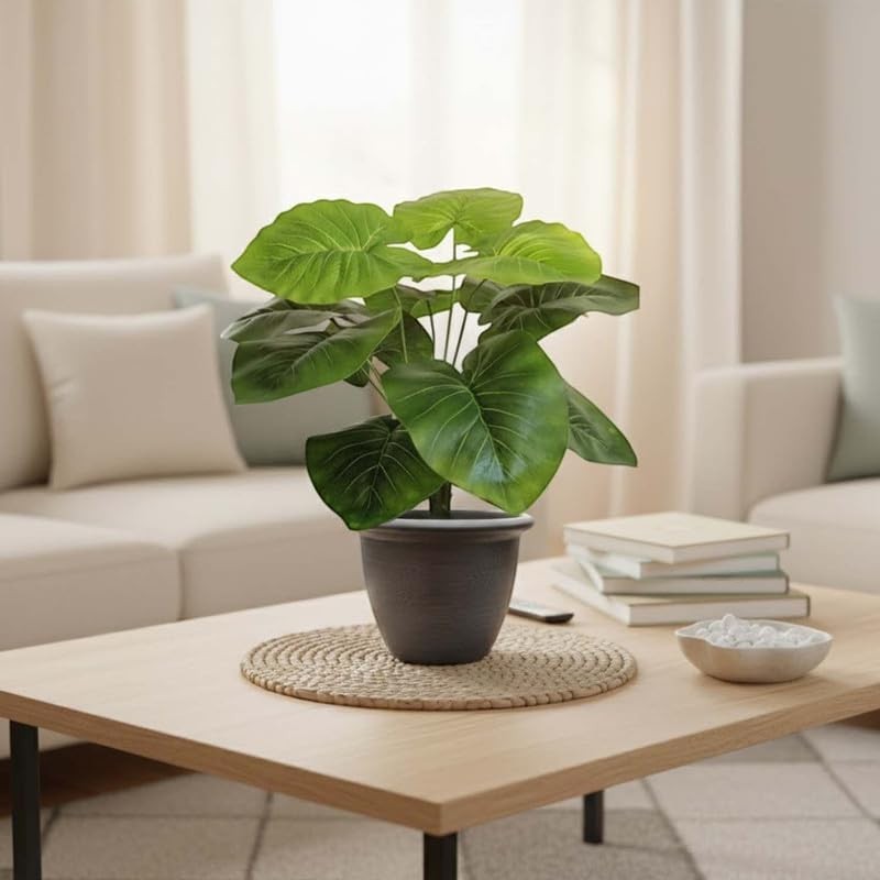 GoHooked artificial philodendron plant with 12 green leaves in a dark pot, perfect for home or office decor.