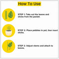 Go Hooked artificial Epipremnum Aureum plant assembly instructions: take out leaves and sticks, place pebbles in pot and insert sticks, then attach leaves.