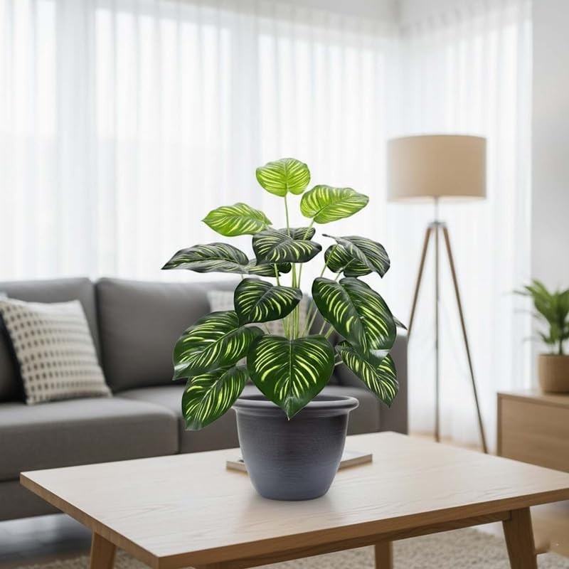 Go Hooked dual shade big leaves artificial plant in a dark grey pot, realistic polyester leaves with green and yellow stripes.