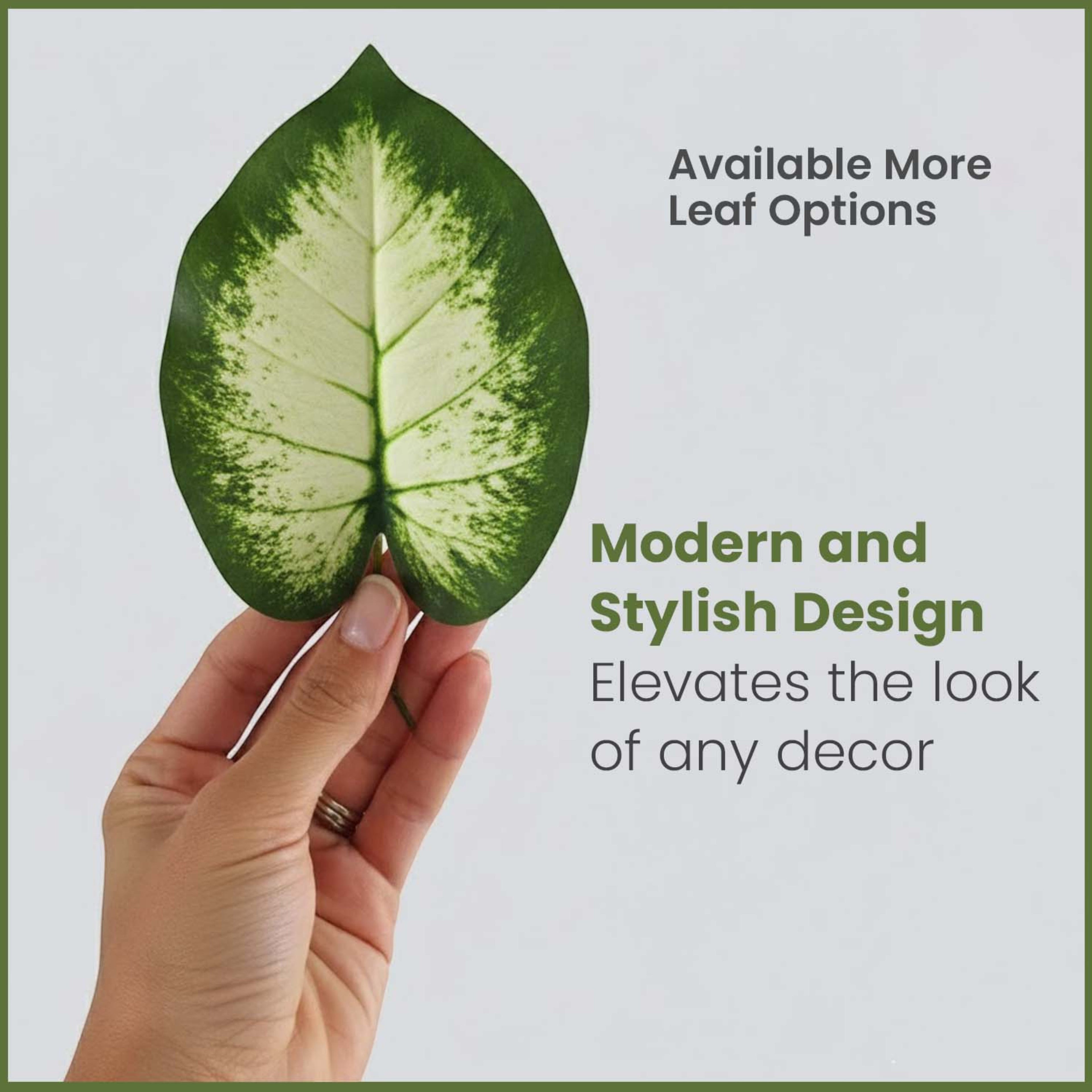 GoHooked artificial plant leaf with green and white variegated pattern held by a hand against a neutral background