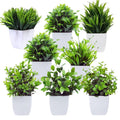 GoHooked set of 7 artificial green plants in white square pots, varying leaf shapes and sizes for home decor.