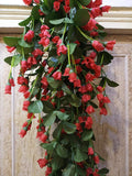 GoHooked artificial red rose and orchid flower garland with green leaves, made of silk and plastic, for home decor.