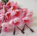 GoHooked baby pink artificial cherry blossom orchid flower bunch with polyester petals and plastic stems for home decor.