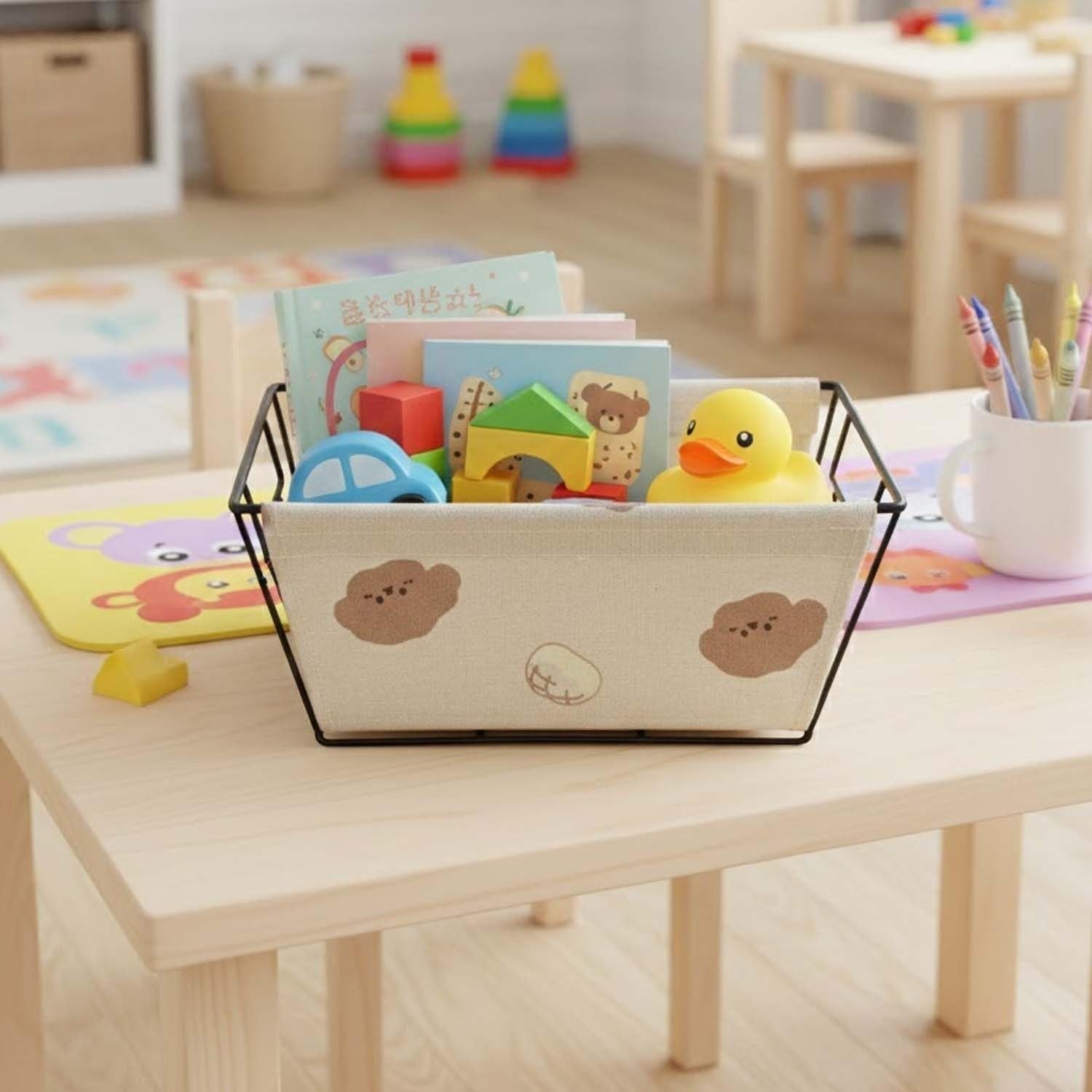 GoHooked beige metal storage basket with cute bread and bear print, removable fabric liner, holding toys and books.