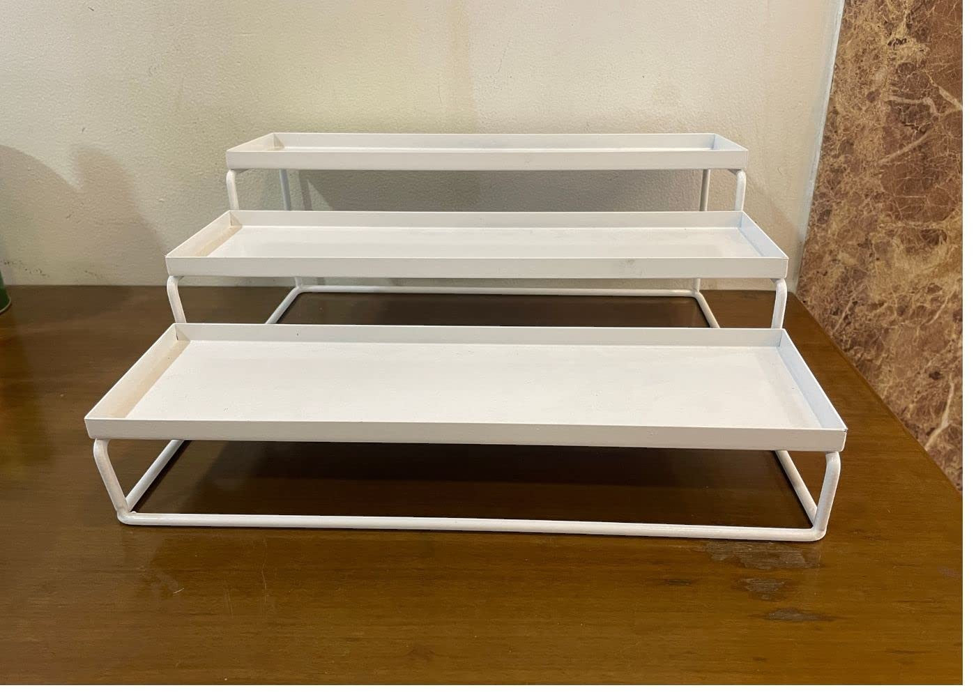 GoHooked Bianco 3-tier white metal step standing rack for kitchen spice bottles, pantry, or bathroom storage.