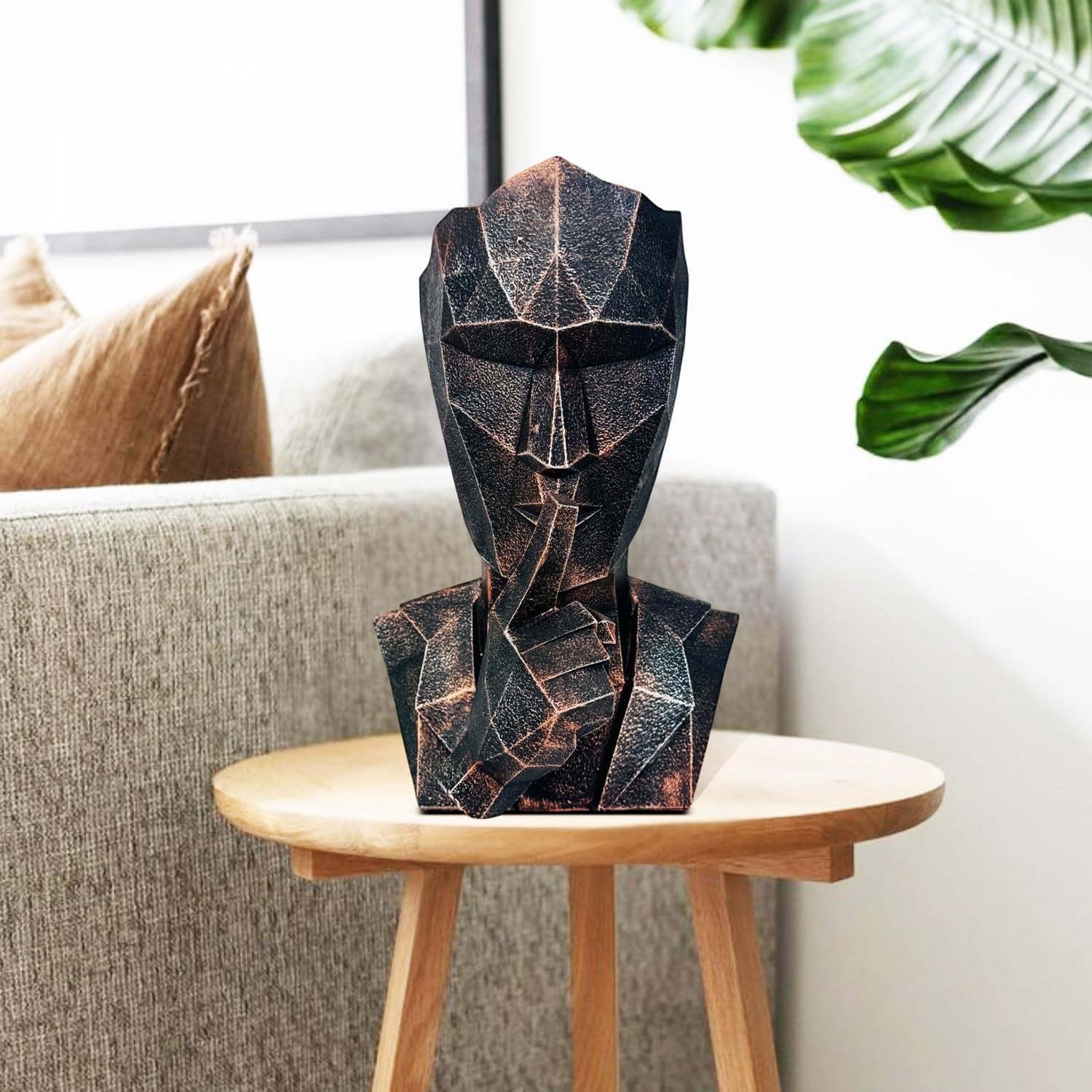 GoHooked BIANCO abstract geometric polyresin showpiece, black copper finish, depicting a face with finger to lips.
