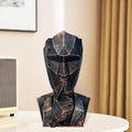 GoHooked BIANCO abstract geometric polyresin showpiece in black copper finish, depicting a face with finger to lips.