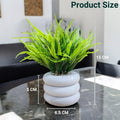 GoHooked Bianco artificial mini plant in a white stacked pot. Realistic green faux foliage for home and office decor.