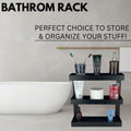 GoHooked Bianco black metal 3-tier bathroom shelf rack organizer holding toiletries, toilet paper, and soap.