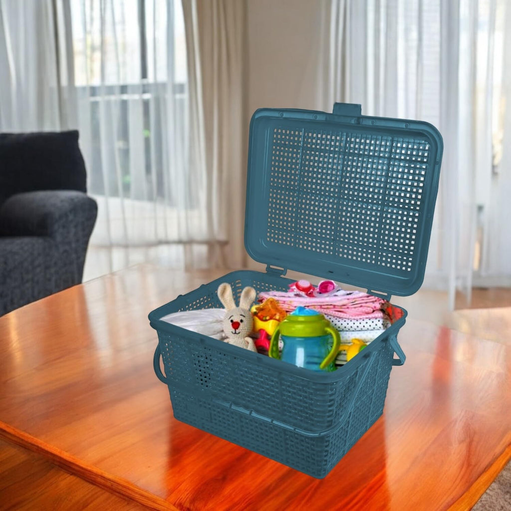 GoHooked BIANCO grey plastic picnic storage basket with lid, handle, and snap lock, filled with baby items and toys.