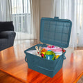 GoHooked BIANCO grey plastic picnic storage basket with lid, handle, and snap lock, filled with baby items and toys.