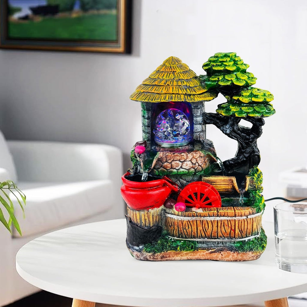 GoHooked BIANCO polyresin tabletop waterfall fountain with LED lights and adjustable speed control, featuring a rustic house and tree design.