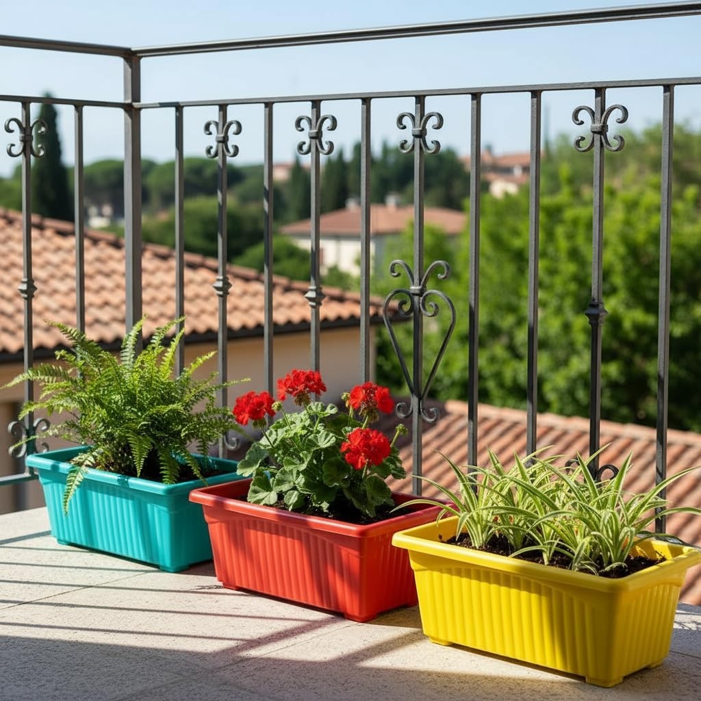 GoHooked Bianco rectangular plastic plant pots in turquoise, red, and yellow on a balcony. Pack of 3.