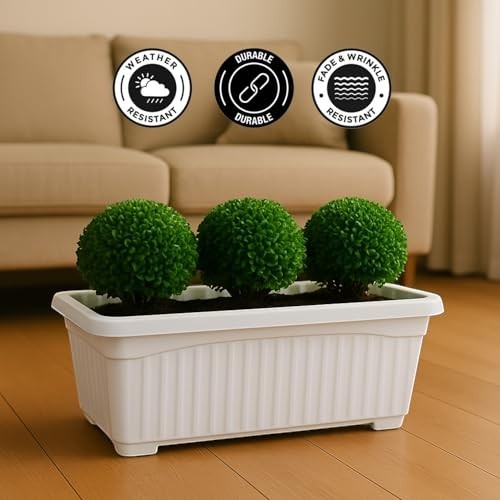 GoHooked Bianco white rectangular plastic planter with fluted sides, holding three green artificial plants. Suitable for indoor or outdoor use.