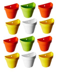 GoHooked Bianco wall hanging pot set of 12 in assorted colors: orange, green, yellow, and white. Made of durable polypropylene plastic.