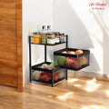 Go Hooked black 2-layer metal mesh storage trolley with rotating drawers filled with fruits and vegetables.