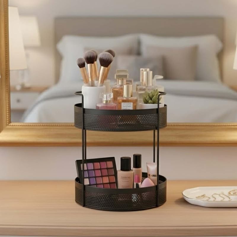 Go Hooked black 2-tier metal mesh countertop organizer holding makeup brushes, perfumes, and cosmetics.