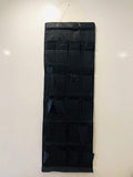 Go Hooked black non-woven fabric over-the-door organizer with 20 pockets for shoes and accessories.