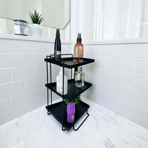 GoHooked black 3-tier iron countertop organizer rack holding toiletries and bottles. Space-saving design.