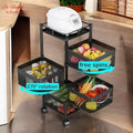 Go Hooked black 4-layer rotating metal mesh trolley organizer filled with fruits, vegetables, and kitchen supplies.