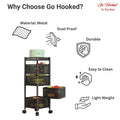 GoHooked black 4-layer metal rotating storage trolley with mesh drawers filled with fruits and vegetables.