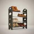 Go Hooked black 4-tier plastic shoe rack with silver metal shelves holding various shoes including boots, oxfords, and sneakers.
