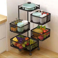 Go Hooked black 5-tier rotating kitchen trolley organizer with mesh baskets filled with fruits, vegetables, bottles, and dishes.