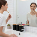 Go Hooked black plastic bathroom accessory set with heart embossed design, includes soap dispenser, toothbrush holder, tumbler, and soap dish.