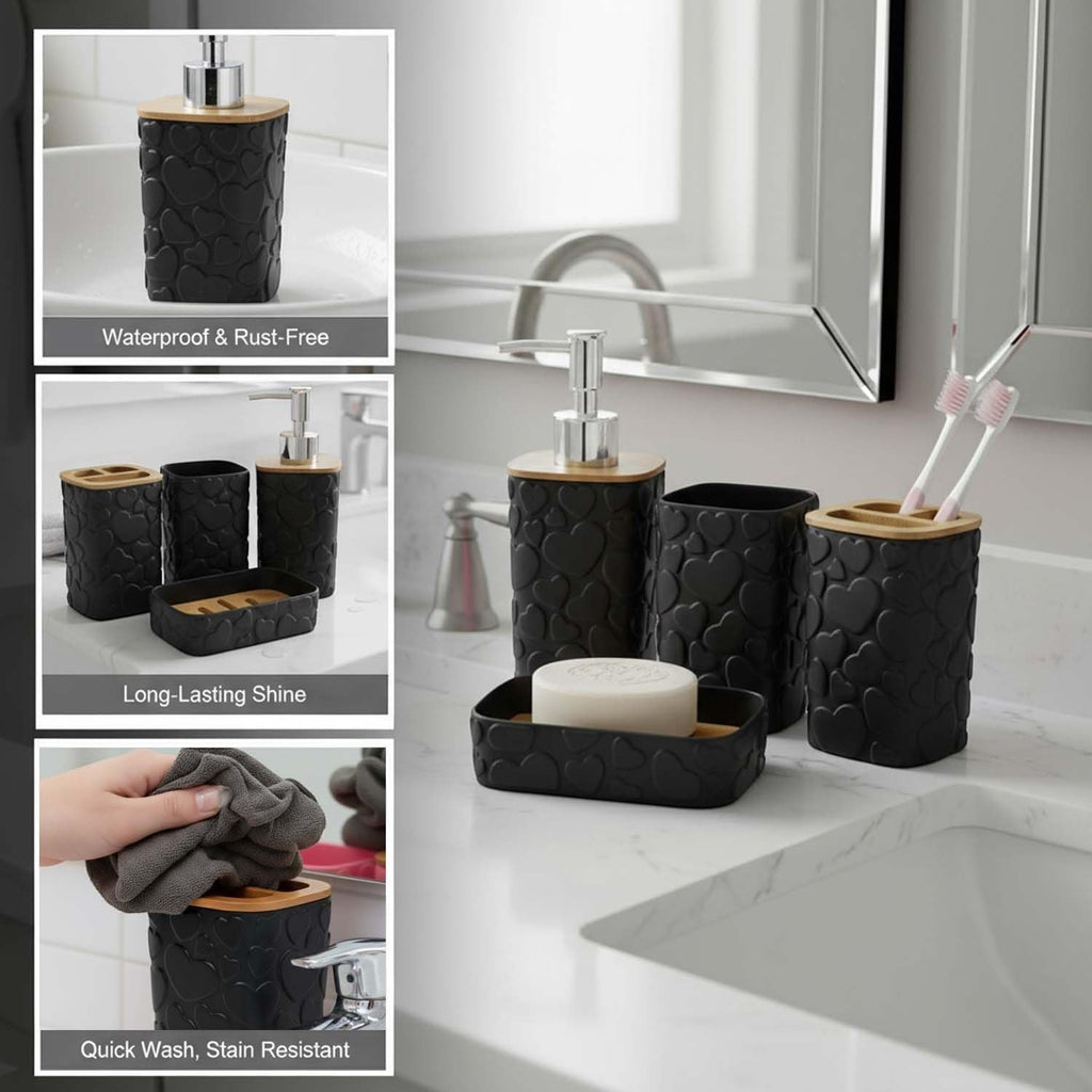 Go Hooked black plastic 4-piece bathroom set with heart embossed design, includes soap dispenser, tumbler, toothbrush holder, and soap dish.