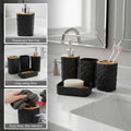Go Hooked black plastic 4-piece bathroom set with heart embossed design, includes soap dispenser, tumbler, toothbrush holder, and soap dish.