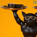 Go Hooked black polyresin bulldog statue with gold sunglasses holding two gold serving trays.