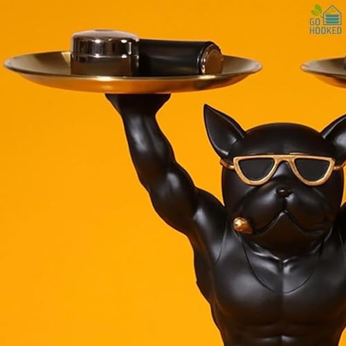 Go Hooked black polyresin bulldog statue with gold sunglasses holding two gold serving trays.
