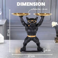 GoHooked black polyresin bulldog statue with gold sunglasses and belt, holding two gold serving trays.