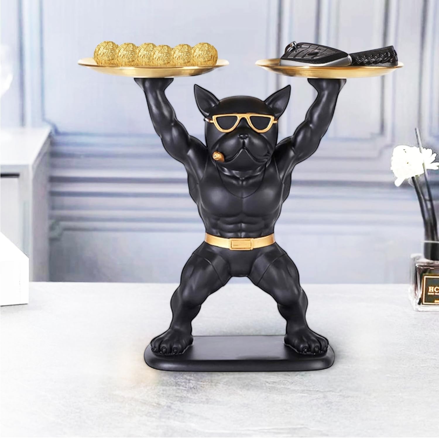 GoHooked black polyresin bulldog statue with gold sunglasses and belt, holding two gold serving trays.