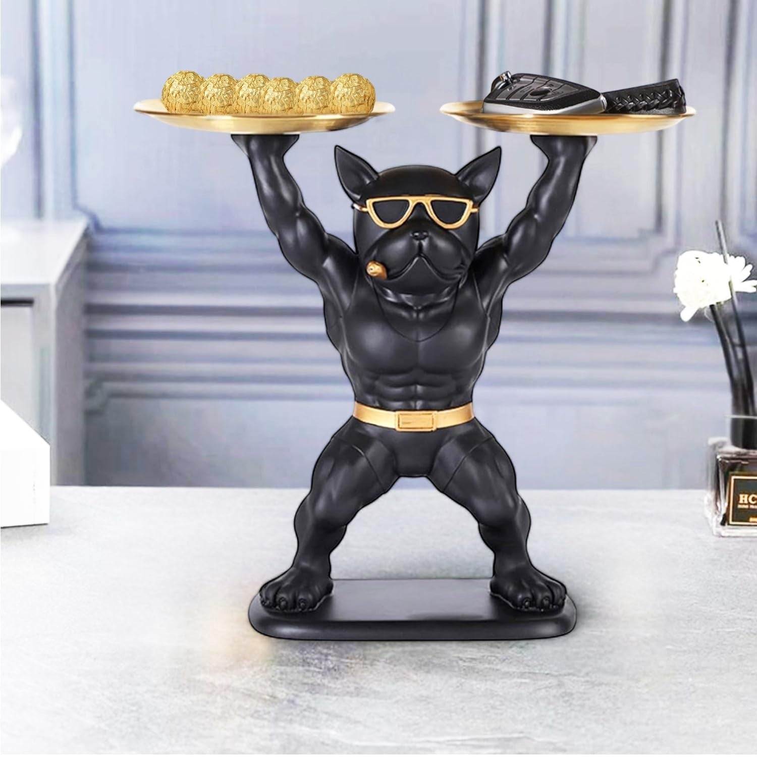 Go Hooked black polyresin bulldog statue with gold sunglasses and cigar, holding two gold serving trays.