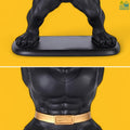 Go Hooked black polyresin bulldog statue with gold belt, featuring muscular torso and paws on a tray stand.