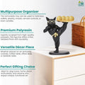 Go Hooked black polyresin bulldog figurine with sunglasses holding a gold tray with decorative balls.