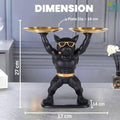 Go Hooked black polyresin bulldog statue holding two gold serving trays, wearing sunglasses and a gold belt.