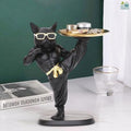 GoHooked black polyresin bulldog statue wearing sunglasses, holding a gold tray with cosmetics. Decorative storage stand.