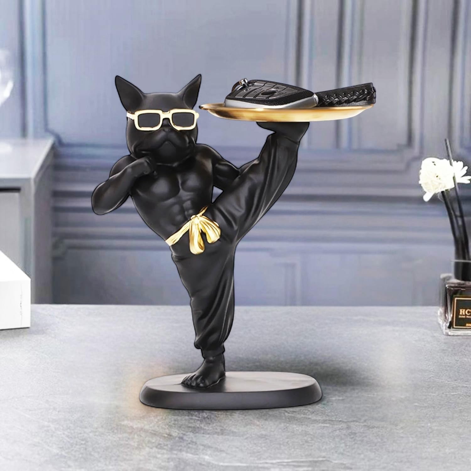Go Hooked black polyresin bulldog statue wearing sunglasses and holding a gold tray with items.