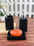 GoHooked black ceramic 3-piece bathroom set with textured design, includes soap dispenser, toothbrush holder, and soap dish.
