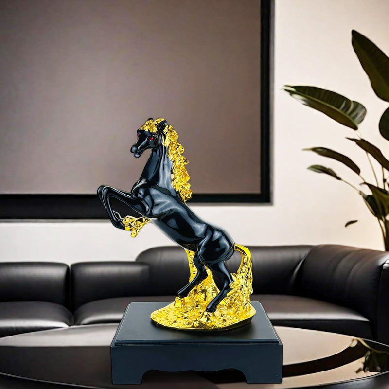 GoHooked matt black polyresin rearing horse statue with gold mane and accents, symbolizing success and wealth.