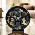 GoHooked black and gold resin bust of a woman with palm leaf frame, decorative Vastu and Feng Shui accent.