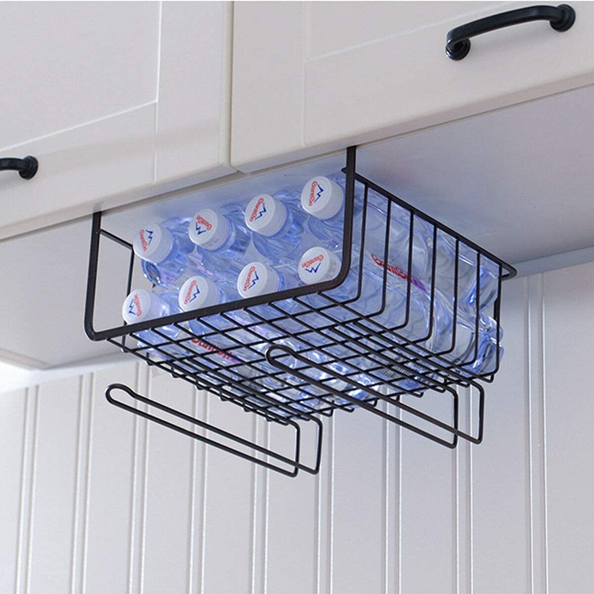 GoHooked black powder-coated iron under cabinet storage basket holding water bottles.