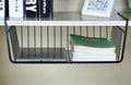 Go Hooked black powder coated iron under shelf basket with a tablet and notebooks. Adds storage to cabinets.