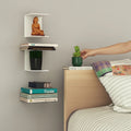 Go Hooked heavy duty black iron wall shelves holding books, a plant, and a figurine. Ideal for study rooms or bedrooms.