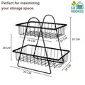 GoHooked black metal 2-tier fruit basket with open wire design for kitchen countertop storage. Dimensions: 32cm H x 30cm W x 18cm D.