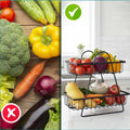 GoHooked black metal 2-tier fruit basket with open wire design, perfect for countertop storage of fruits and vegetables.