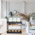 GoHooked black metal 2-tier standing rack with cute cat-shaped jars on top and spice jars on bottom.